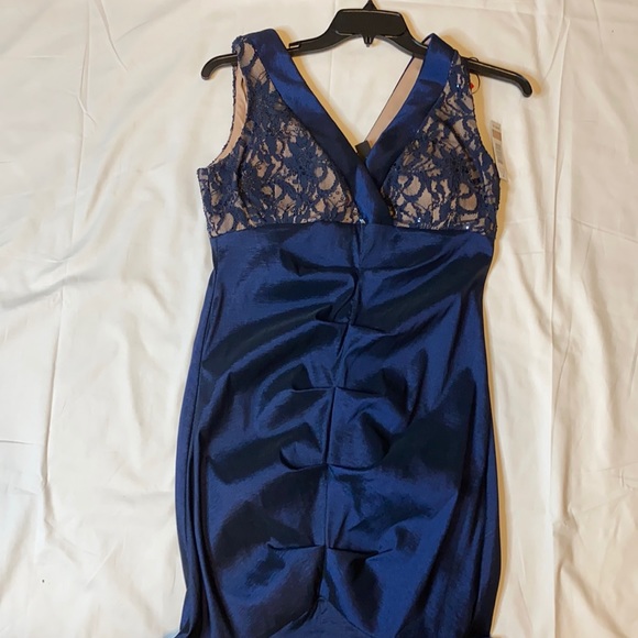 R & M Richards Dresses & Skirts - R & M Richards
V Neck Sleeveless long flowing Gown